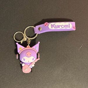 New Kuromi Keychain, Bag Chain.
Kuromi Playing Guitar. Wearing Headphones.